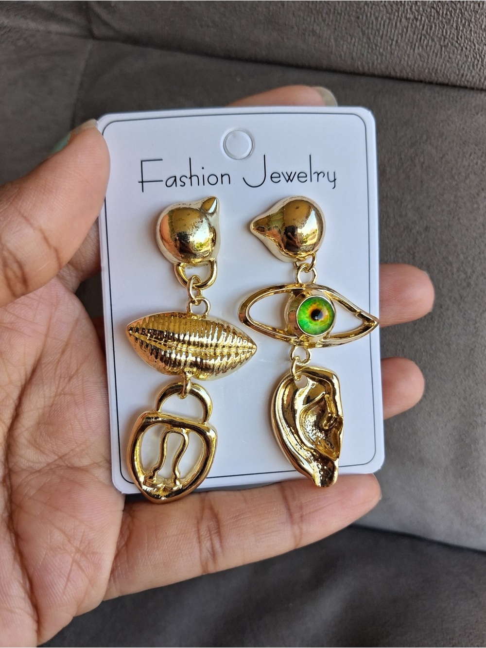 Schiaparelli Fashion Jewelry Gold Asymmetrical Eye & Shell Charm Drop Earrings